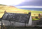 Self Catering Northern Highlands | Luxury detached Cottage, Sea Views, Jacuzzi Bath, Sauna, Open Fire, Conservatory, Open Fire